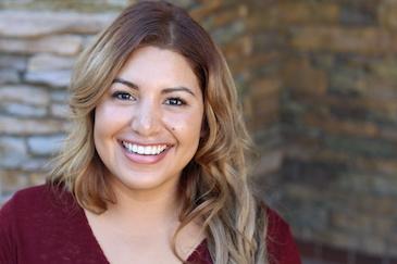 woman smiling after veneers in charlotte
