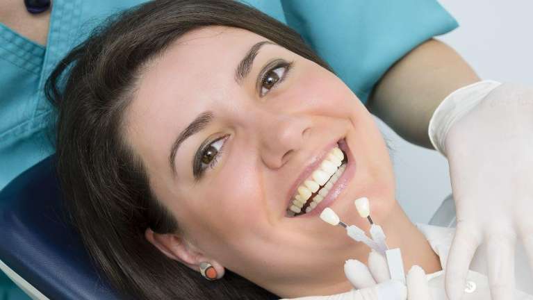 woman getting veneers in weddington