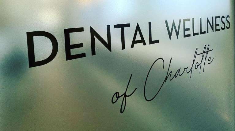 Dental Wellness of Charlotte sign