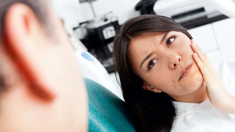 woman in dental pain