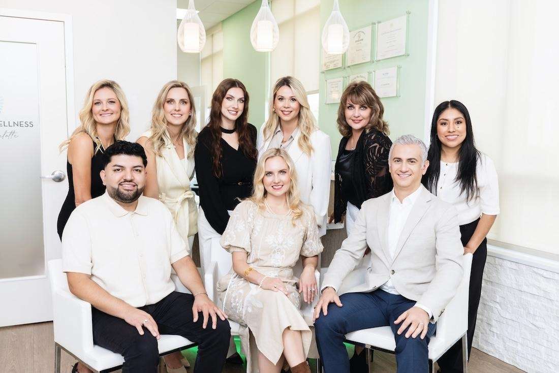 Dental Wellness of Charlotte team smiling together, charlotte nc